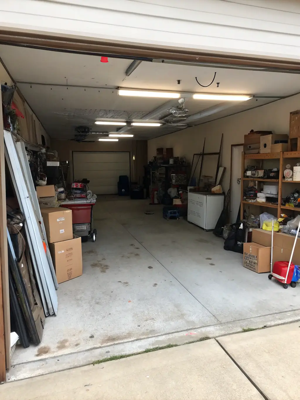 A cluttered office space with old equipment and boxes before junk removal, contrasted with the same office space after B&T Junk Removal has cleared everything out, showcasing a clean and organized workspace.